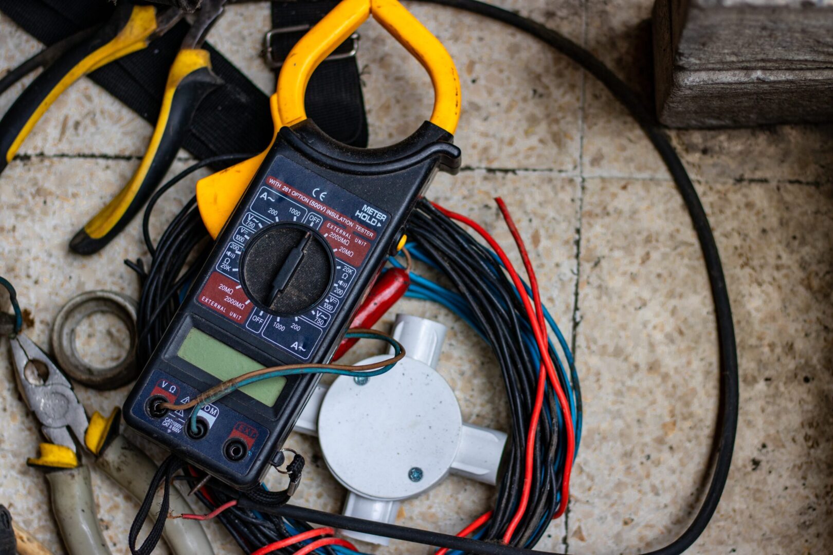 A close up of an electrical device on the ground